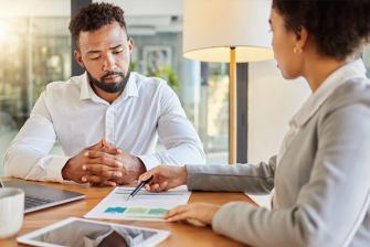 Man and woman looking at paperwork